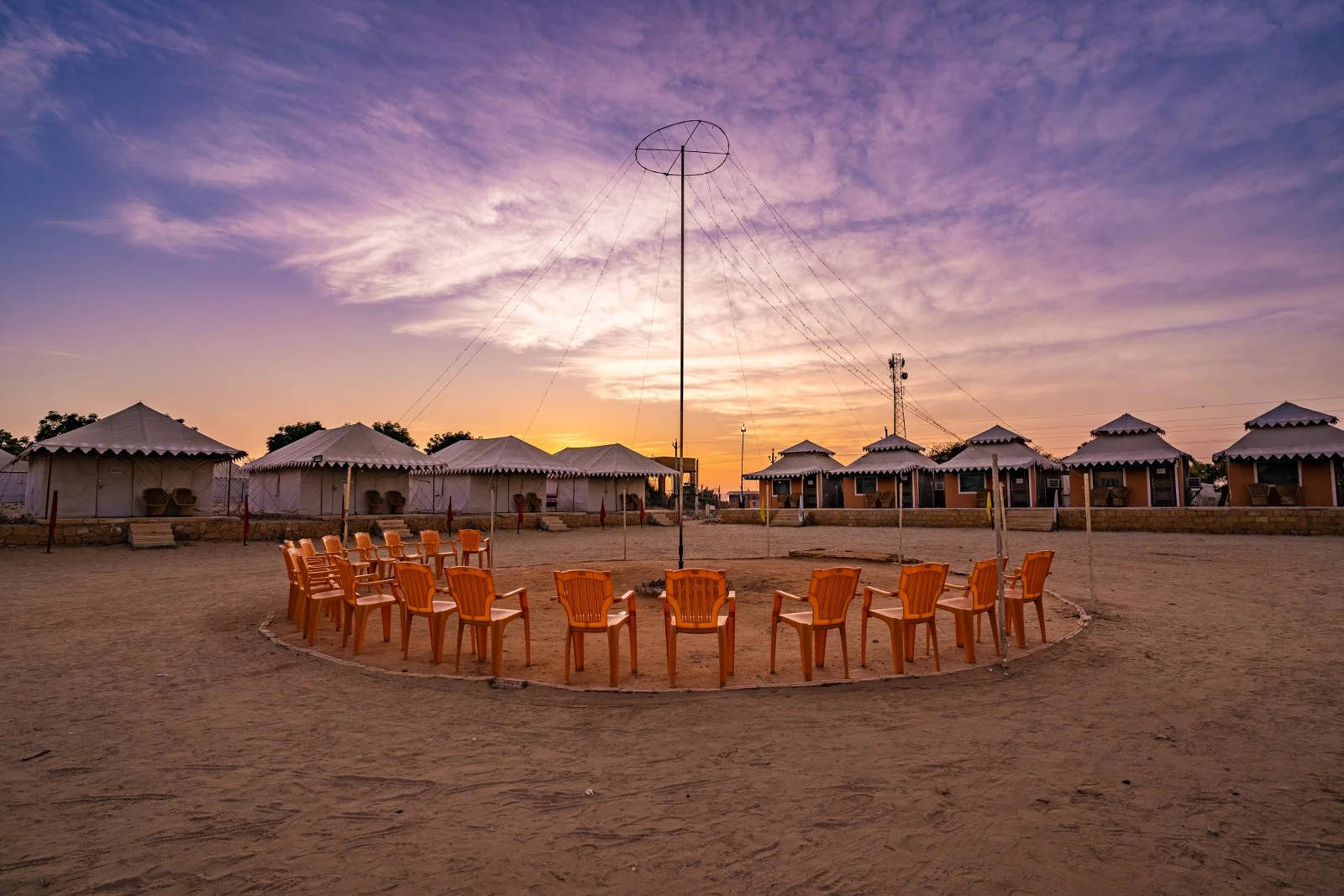 Camp seating circle at sunset