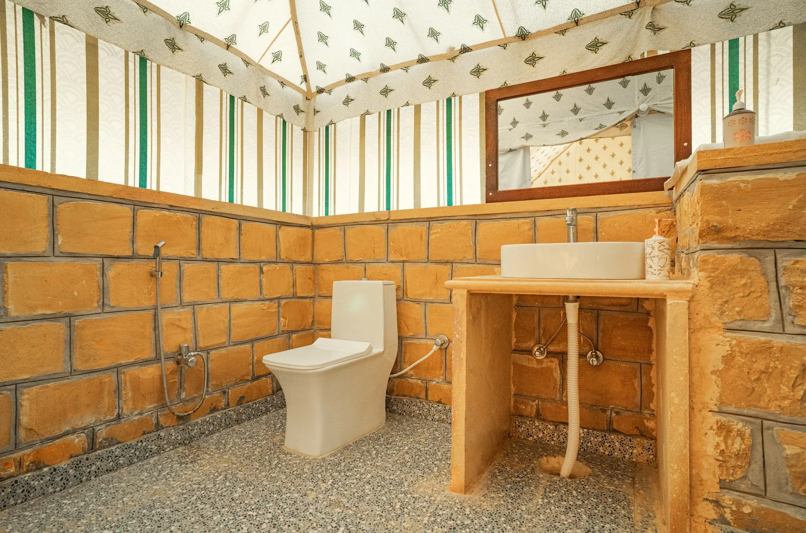 Attached bathroom in a tent