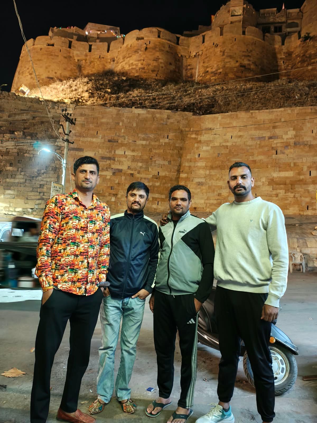 Guests below Jaisalmer Fort at night