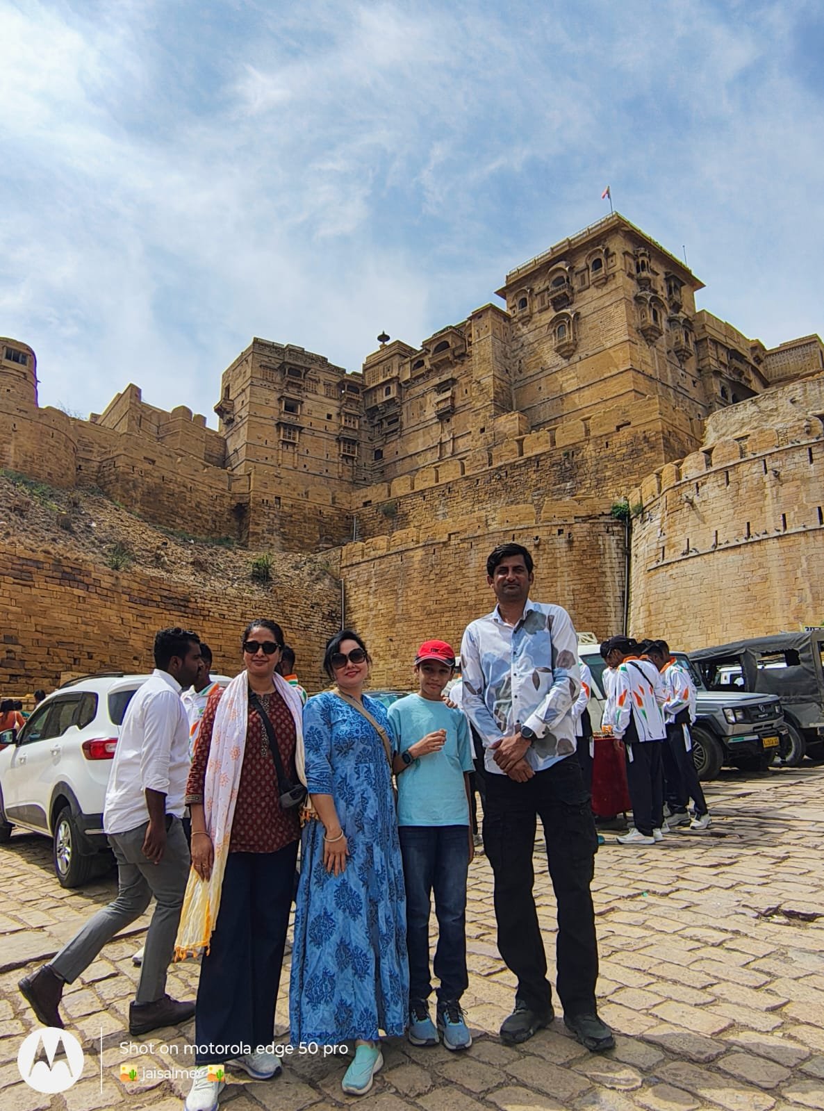 Saim with a family below Jaisalmer Fort