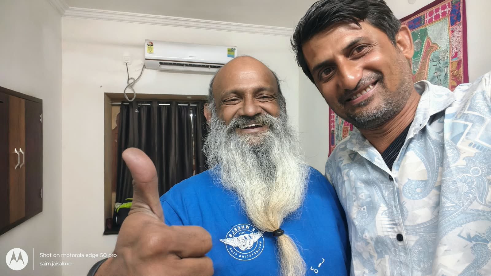 Saim with a travelling biker
