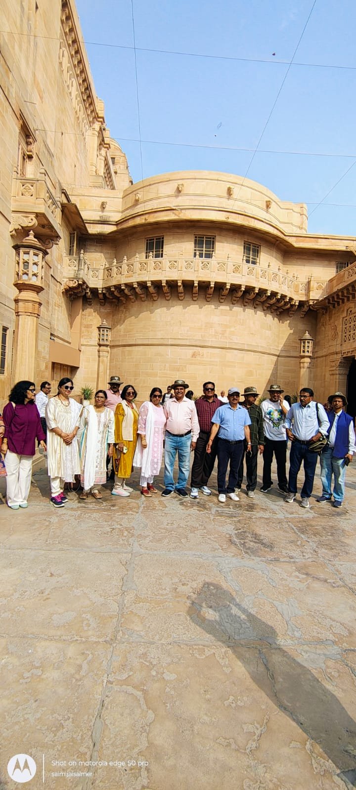 Group outside a heritage palace