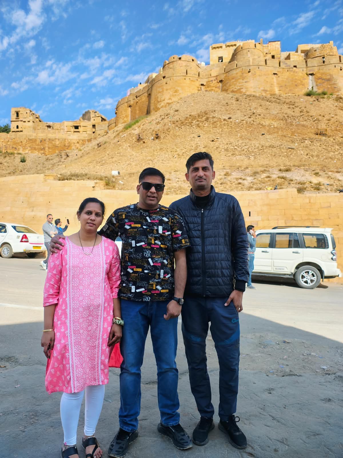 Saim with guests below the fort