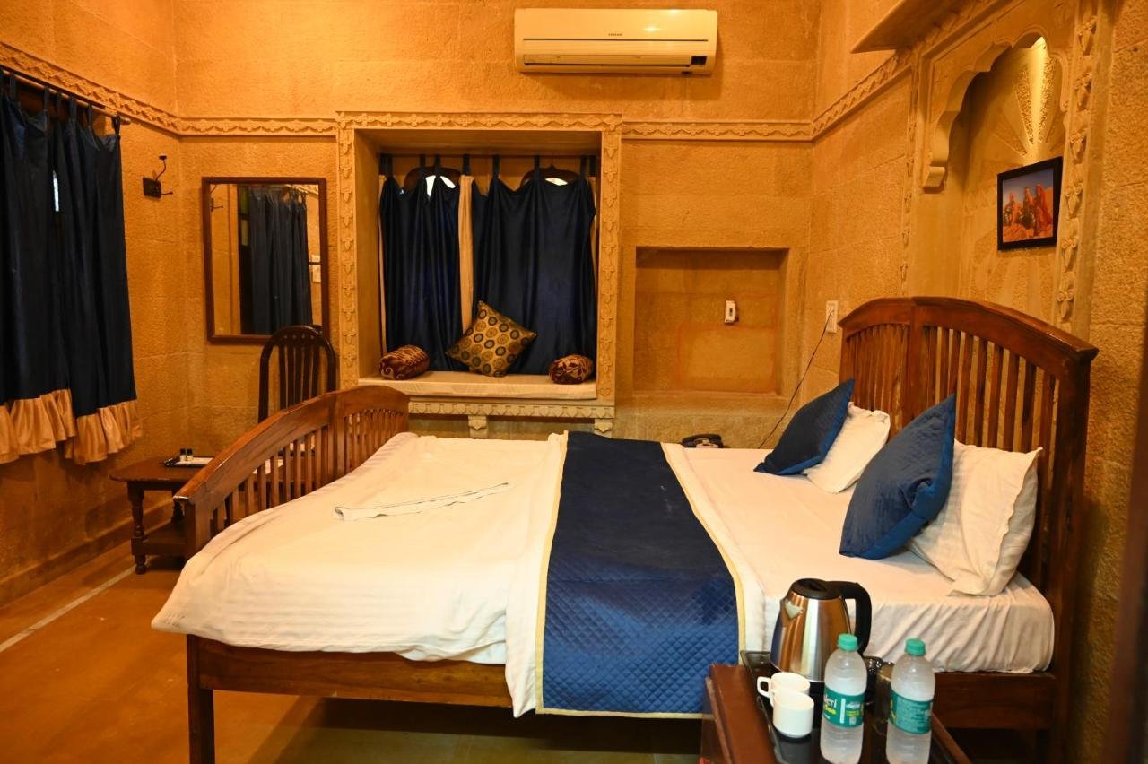 Double room with blue linen